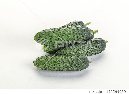 Fresh natural organic cucumbers heap 111599059