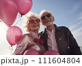 Portrait of romantic senior family. couple smiling mature people with gray hair in casual clothes. 111604804