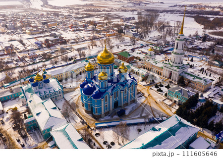 Aerial view of the Nativity-Bogoroditsky monastery surrounded by residential buildings in Zadonsk Aerial view of the Nativity-Bogoroditsky monastery surrounded by residential buildings in Zadonsk 111605646