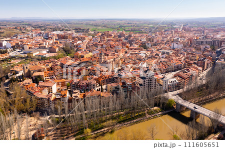 Drone view of Aranda de Duero cityscape on river banks 111605651