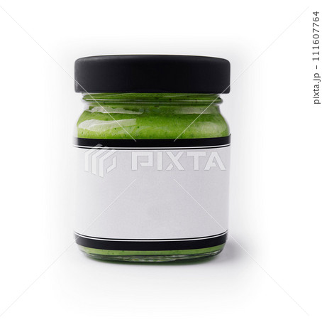 Pesto sauce in a glass jar isolated Pesto sauce in a glass jar isolated 111607764