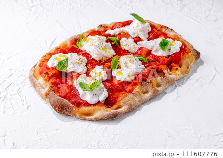 Pizza Margherita on white stone 111607776