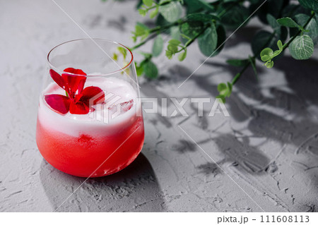 red cocktail white foam red flower red cocktail white foam red flower 111608113