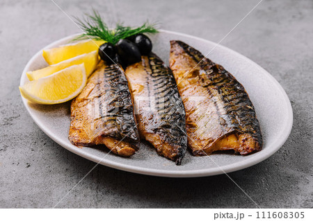 deliciously roasted mackerel on a grill 111608305