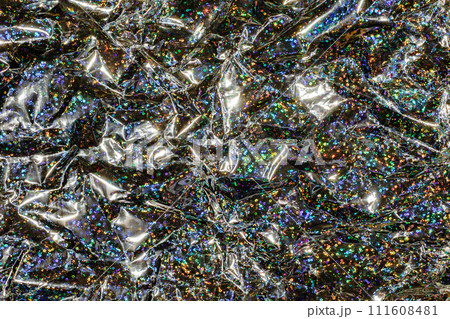 Holographic iridescent wrapping paper radiant background Holographic iridescent wrapping paper radiant background 111608481