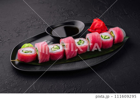 Japanese uramaki tuna roll with cucumber Japanese uramaki tuna roll with cucumber 111609295