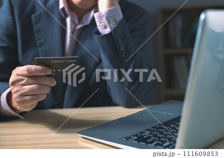 businessman showing credit card In office, man stressed with credit card debt, recession, household debt, unemployment businessman showing credit card In office, man stressed with credit card debt, recession, household debt, unemployment 111609853