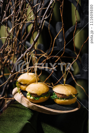 three mini burgers in the forest 111609880