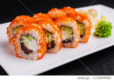 Macro shot of california maki sushi rolls with rice Macro shot of california maki sushi rolls with rice 111609985