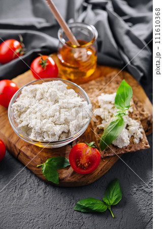 Feta Cheese with Cherry Tomatoes and Basil 111610368