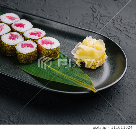 Sushi rolls with tuna on plate Sushi rolls with tuna on plate 111611624