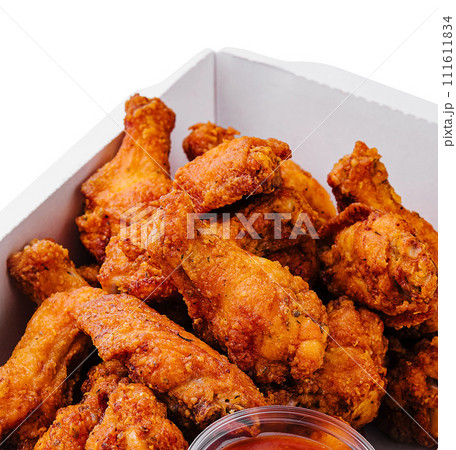 Takeaway box of crispy grilled chicken legs 111611834