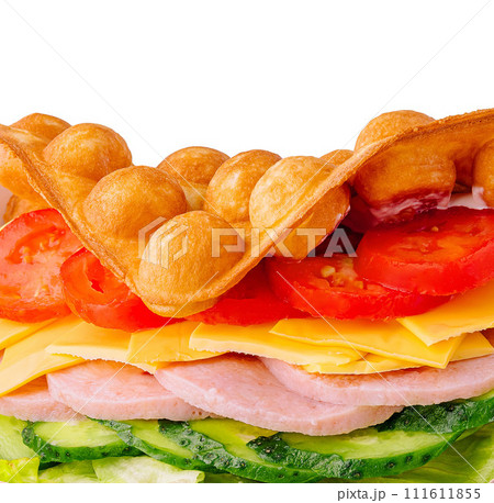 Belgian waffles with ham, cheese and salad closeup 111611855