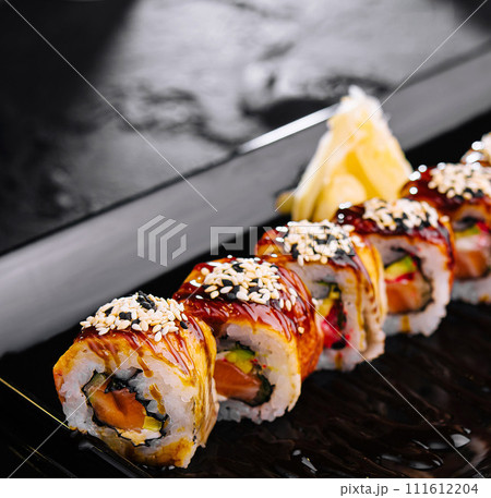 Traditional canada sushi roll on plate Traditional canada sushi roll on plate 111612204