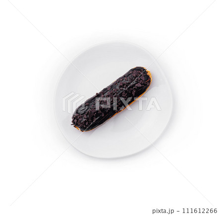 Cake eclair glazed with chocolate cream top view Cake eclair glazed with chocolate cream top view 111612266