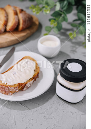 sandwich with ricotta cheese on plate 111612551