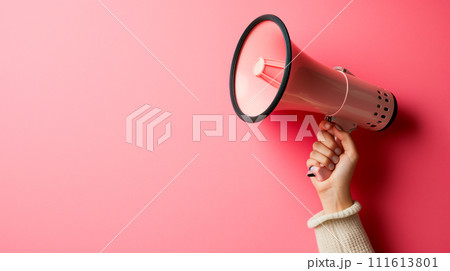 AI-generated content. Attention please. Unknown woman holds loudspeaker which is symbol of advertising on pastel pink wall background studio, PR and promotion. Generative AI.  111613801