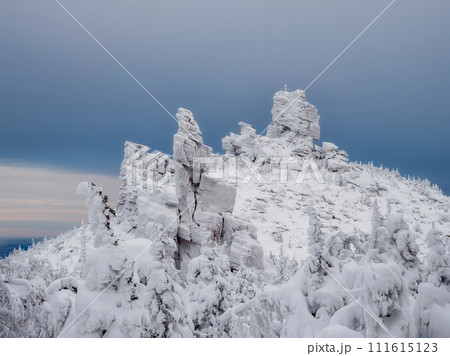 The rocks are covered with ice. 111615123