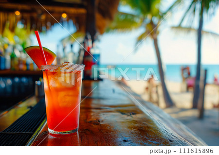 Tropical cocktail on a beach cafe table. Refreshing fruit cocktail on luxury tropical beach resort. Party, summer vacations, holidays, summertime, exotic alcohol drinks. Summer vibes, beach tourism 111615896