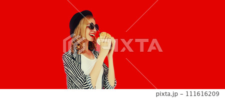 Portrait of happy cheerful young woman having fun with burger fast food Portrait of happy cheerful young woman having fun with burger fast food 111616209