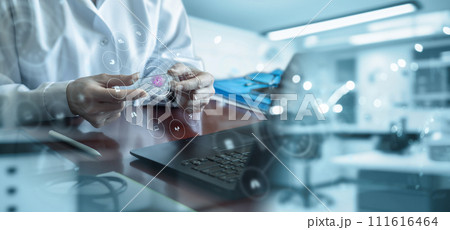 Doctor shows sample of germs on glass. 111616464