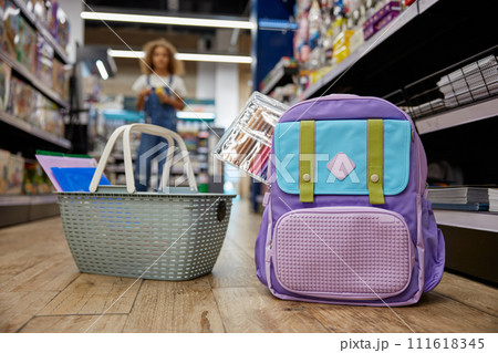 School supplies shopping at stationery store with focus on personal belongings 111618345