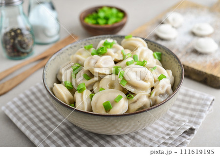 Russian pelmeni, dumplings with meat 111619195