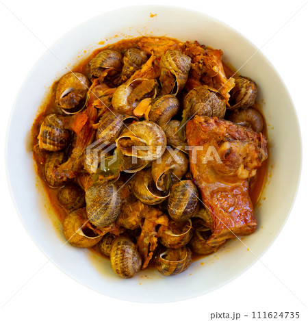 Stewed snails with rabbit meat and sausages 111624735