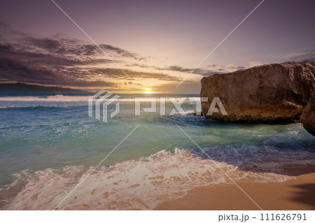 Sandy beach with the blue ocean and sunset scene Sandy beach with the blue ocean and sunset scene 111626791
