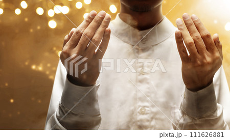 Muslim man raised her hands and prayed to Allah Muslim man raised her hands and prayed to Allah 111626881