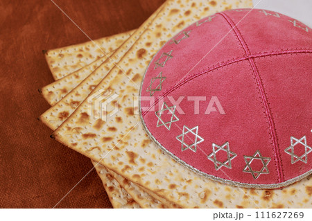 Jewish traditional holiday with Passover unleavened bread Matzah Pesach celebration a ritual Jewish traditional holiday with Passover unleavened bread Matzah Pesach celebration a ritual 111627269