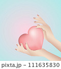Woman hands holding a pink heart. Keeping love 111635830