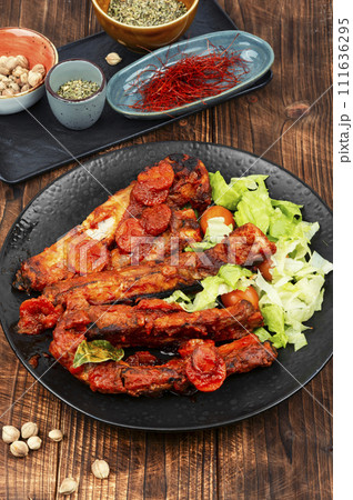 Roasted yummy pork ribs in sauce. 111636295