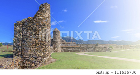 View of the ruins of medieval fortress on sunlight in Roses, Catalonia, northern Spain View of the ruins of medieval fortress on sunlight in Roses, Catalonia, northern Spain 111636730