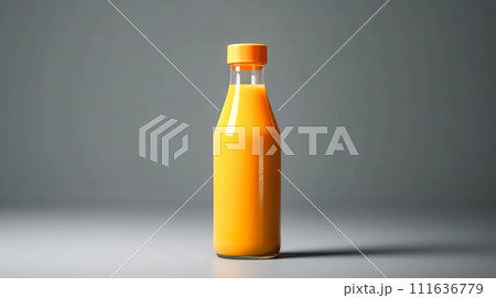 Orange juice in a glass bottle, vibrant background. 111636779