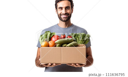 Strong man with a box of fruits and vegetables on a white background 111636795