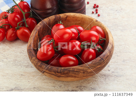 Red bright sweet cherry tomato 111637349