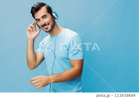 Portrait man background online music t-shirt studio space fun happy copy sing lifestyle blue headphone 111638684