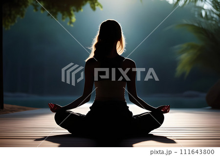 Woman Sitting in Lotus Position 111643800