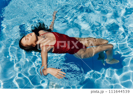 Girl pool female lifestyle sport person swim blue underwater summer water Girl pool female lifestyle sport person swim blue underwater summer water 111644539