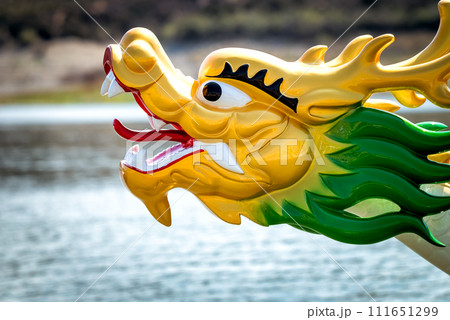 Head of a dragon on the bow of a dragon boa Head of a dragon on the bow of a dragon boa 111651299