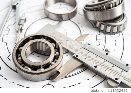 Engineering tools and mechanical industrial with vernier caliper and metal ball bering. Engineering tools and mechanical industrial with vernier caliper and metal ball bering. 111652421