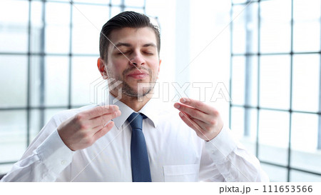 Male office worker close-up in office meditating Male office worker close-up in office meditating 111653566