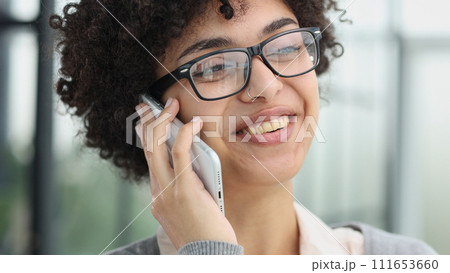 girl in modern smiling talking on the phone 111653660