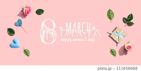 Happy women's day message with a small gift box Happy women's day message with a small gift box 111656088