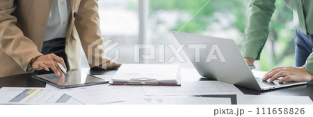 Alternative energy environment businesspeople working and discuss about renewable energy together Alternative energy environment businesspeople working and discuss about renewable energy together 111658826