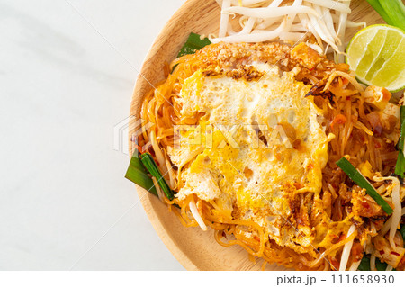 Pad Thai - stir fried noodles in Thai style with egg Pad Thai - stir fried noodles in Thai style with egg 111658930