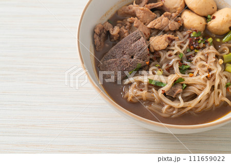 Thai noodle with pork, stewed pork, meatball and pork liver in blood soup 111659022