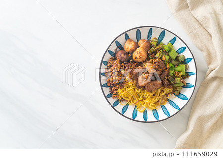 dried egg noodle with pork and meatball dried egg noodle with pork and meatball 111659029
