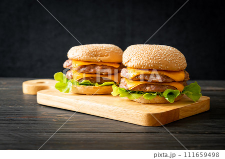 pork hamburger or pork burger with cheese 111659498